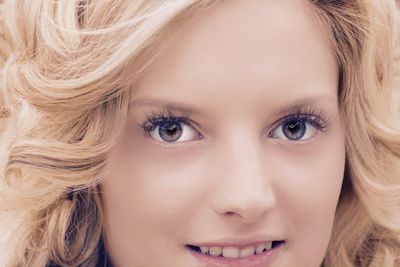 Close-up portrait of smiling beautiful woman