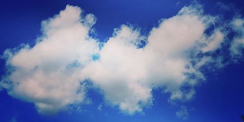 Low angle view of clouds in blue sky