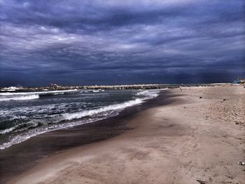 Scenic view of beach against sky