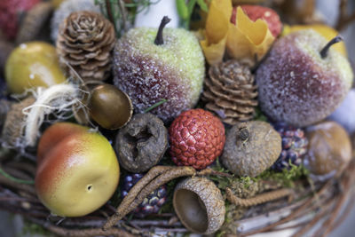 Close-up of fruits in basket on table