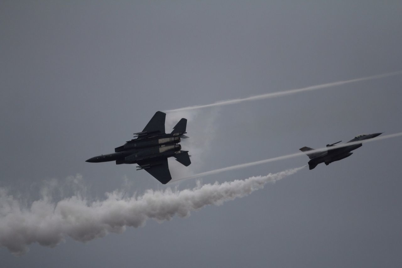 flying, airplane, air vehicle, transportation, mid-air, mode of transport, low angle view, sky, on the move, aircraft wing, cloud - sky, public transportation, travel, journey, aircraft, copy space, nature, motion, outdoors, fighter plane