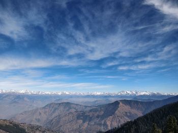 View of mountain range against cloudy sky