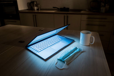 Close-up of laptop on table