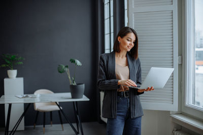 Young woman using mobile phone