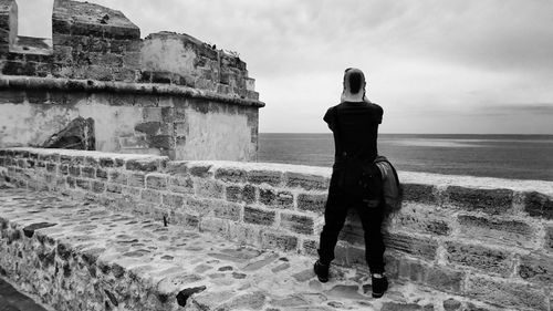 Woman standing on beach