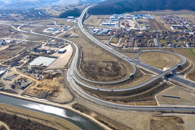 Aerial view of multiple lane highway in city