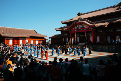 Group of people in front of building