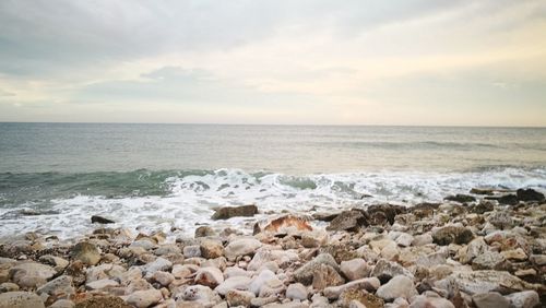 Scenic view of sea against sky during sunset