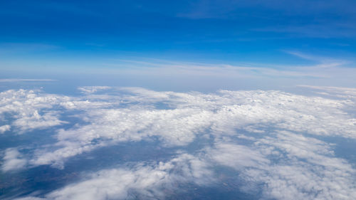 Aerial view of clouds over blue sky