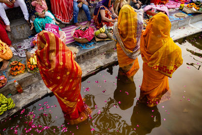 High angle view of people walking in multi colored temple