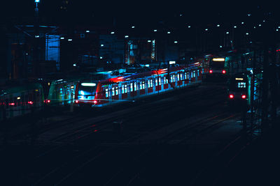 Train in city at night