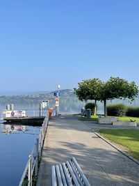 Scenic view of sea against clear blue sky