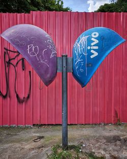 Close-up of road sign on wood
