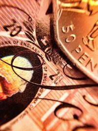 Close-up of coin on table