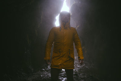 Man standing in cave