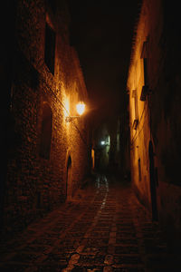 Illuminated street lights at night