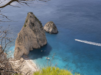 Rock formation in zakynthos island greece near keri village. scenic view of the blue sea.