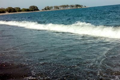 Waves splashing on shore