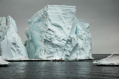 Scenic view of frozen sea against sky