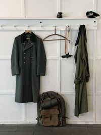 Military clothes on the white wall