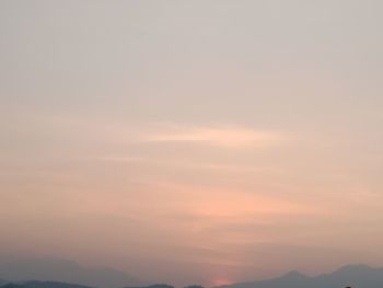 Low angle view of cloudy sky during sunset