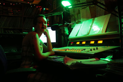 Man sitting on stage