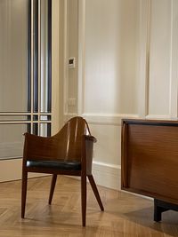 Empty chair on table at home