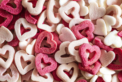 Pink and white sugar hearts background. many small sweet decorative hearts, valentine's day