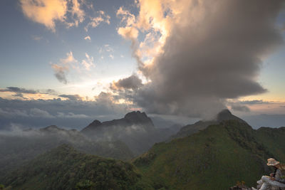 Panoramic view of mountains against sky during sunset