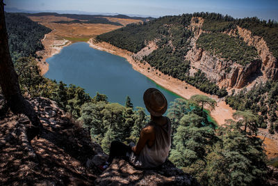 Rear view of man looking at mountains