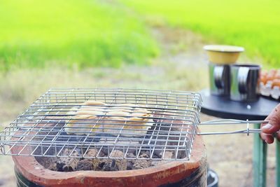 High angle view of meat on barbecue grill