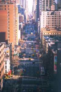 High angle view of street amidst buildings in city