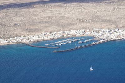 High angle view of sailboat on sea shore