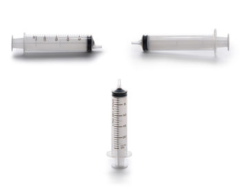 Syringes on white background