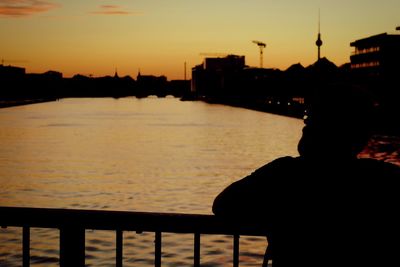 Silhouette of people at sunset