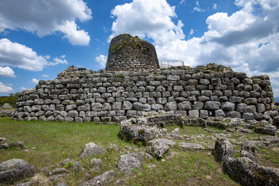 Low angle view of old ruins against sky