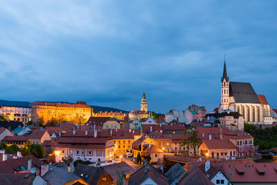 View of illuminated buildings in city