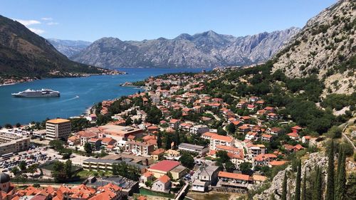 High angle view of townscape by sea