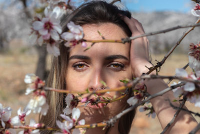 Close-up of young woman looking away