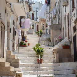 Narrow alley amidst buildings in town