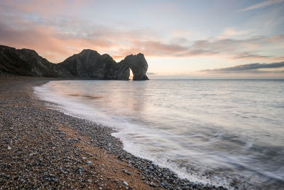 Scenic view of sea against sky during sunset