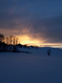 Scenic view of snow covered mountains against sky