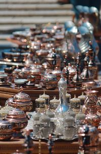 High angle view of decorative containers for sale