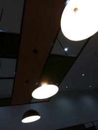 Low angle view of illuminated pendant light