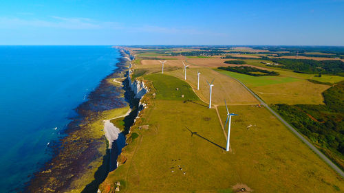 Scenic view of sea against blue sky