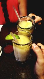 Close-up of woman holding drink