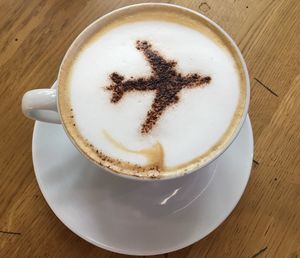 High angle view of cappuccino on table