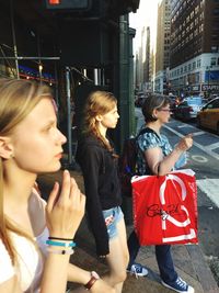 Woman looking at city street