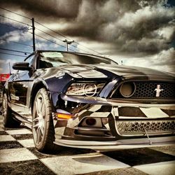 Close-up of car against sky