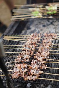 Close-up of meat on barbecue grill